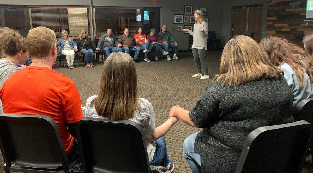 Students and community members gathered at OP Church: A Church of Christ on Friday evening to pray for those affected by the school shooting at Olathe East High School earlier in the day.