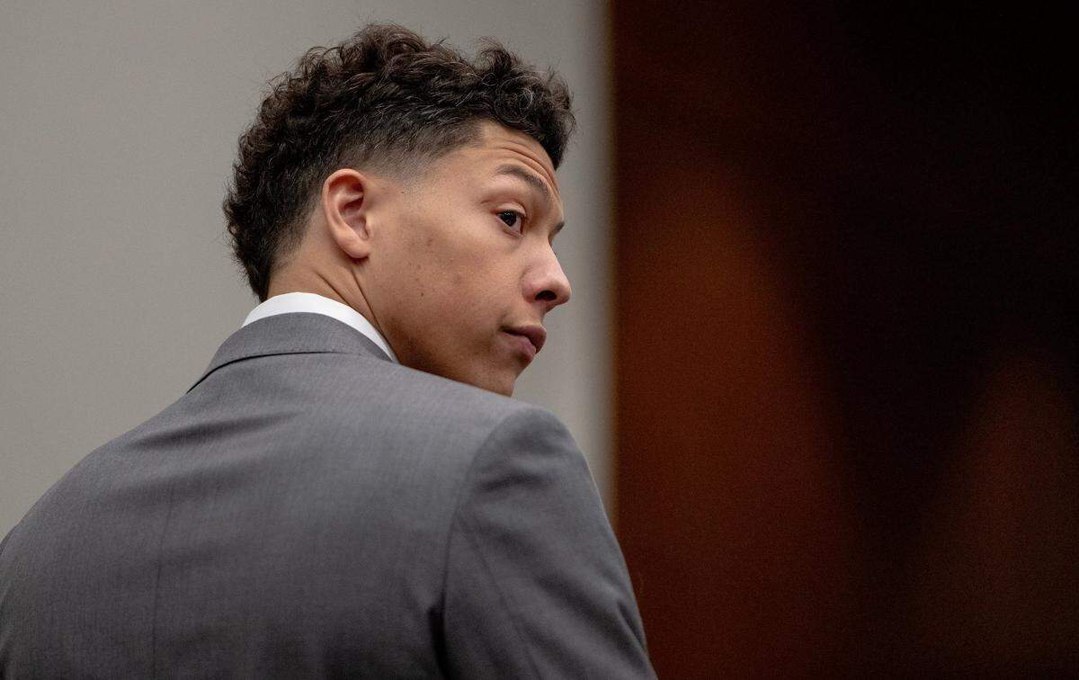 Jackson Mahomes looks toward the state’s prosecution team during a bond motion hearing in Johnson County District Court on Tuesday, May 16, 2023, in Olathe.