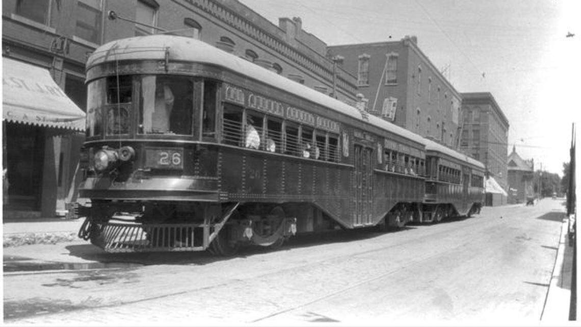 A two-car Kansas City, Clay County & St. Joseph Railway interurban that ran to Excelsior Springs is shown sitting at 13th and Walnut in about 1915.