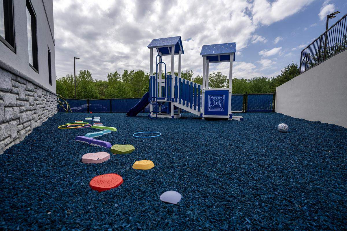 Blue mulch covers the playground at Caravel Autism Health clinic on Wednesday, April 29, 2026, in Liberty.