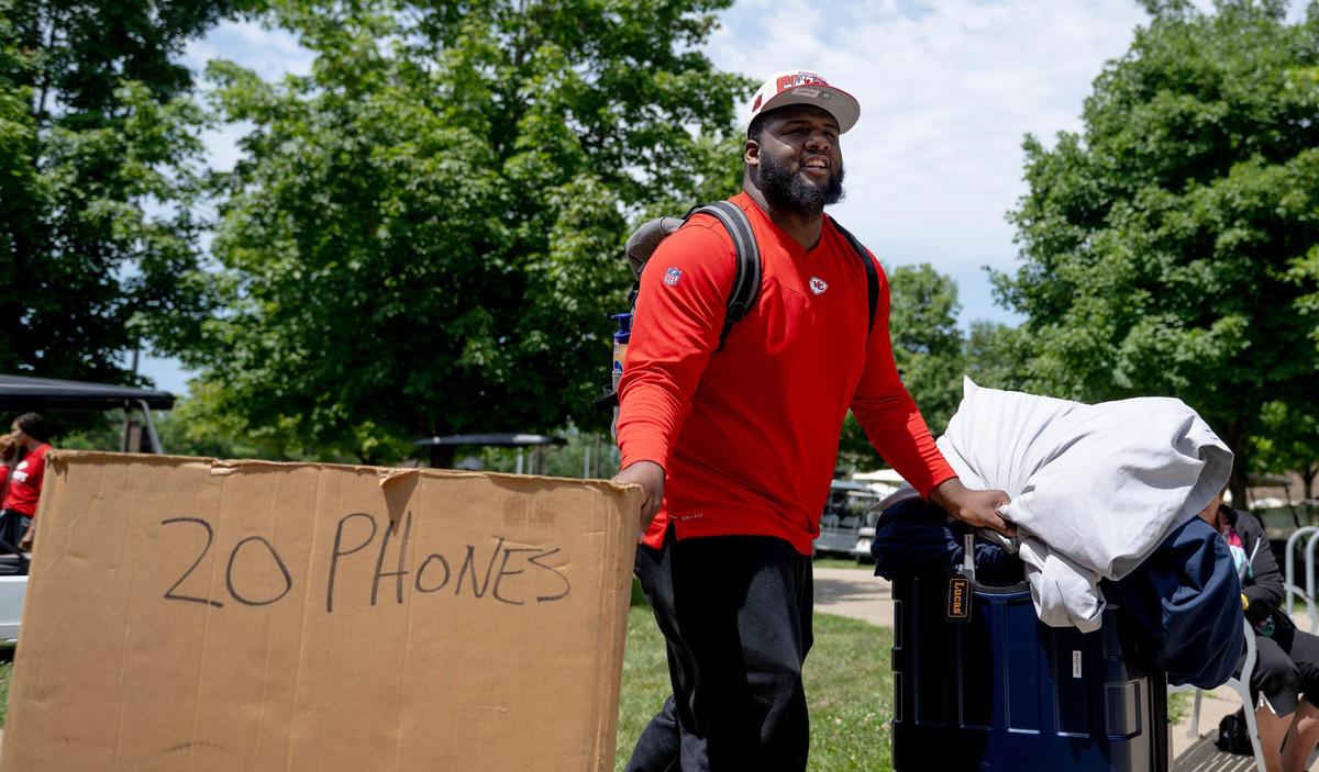 Kansas City Chiefs defensive lineman Keondre Coburn wheels his belongings into a dorm room at Missouri Western State University during the first day of training camp on Tuesday, July 18, 2023, in St. Joseph, Mo.