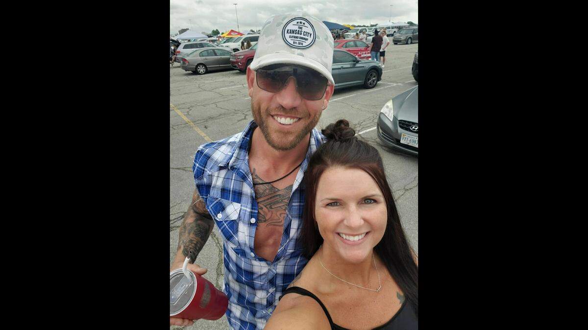 Johnathan Scaletty and Brandi Scaletty had tickets to Saturday’s Luke Combs concert at Arrowhead Stadium. This photo was taken ahead of the concert, shortly before the husband and wife were randomly attacked in the stadium parking lot.