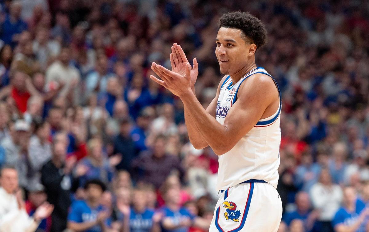 Kansas Jayhawks guard Kevin McCullar Jr. (15) celebrates a score against the Connecticut Huskies during an NCAA basketball game on Friday, Dec. 1, 2023, in Lawrence, Kan.