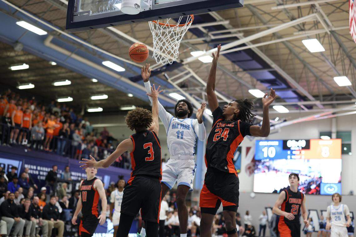 Oak Park’s Corbin Allen puts up a shot against Shawnee Mission Northwest during the finale of 810 Varsity Showcase 36 high school basketball event on Saturday, Dec. 7, 2024.