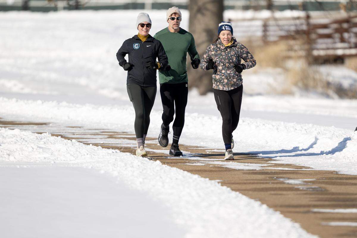 Undeterred by the bitterly cold air, runners pushed through the elements at Meadowbrook Park on Sunday, Jan. 25, 2026, for an afternoon jog in Prairie Village. 