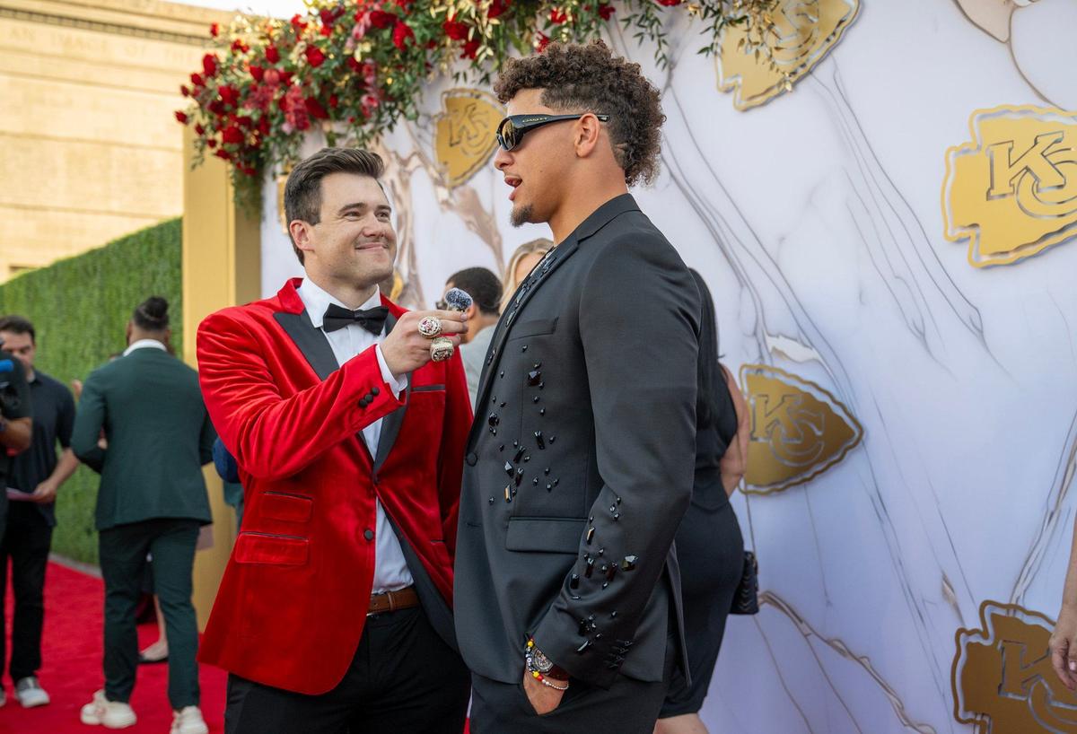 Matt McMullen of the Chiefs talked with quarterback Patrick on the red carpet before the Super Bowl LVIII championship rings presentation event.