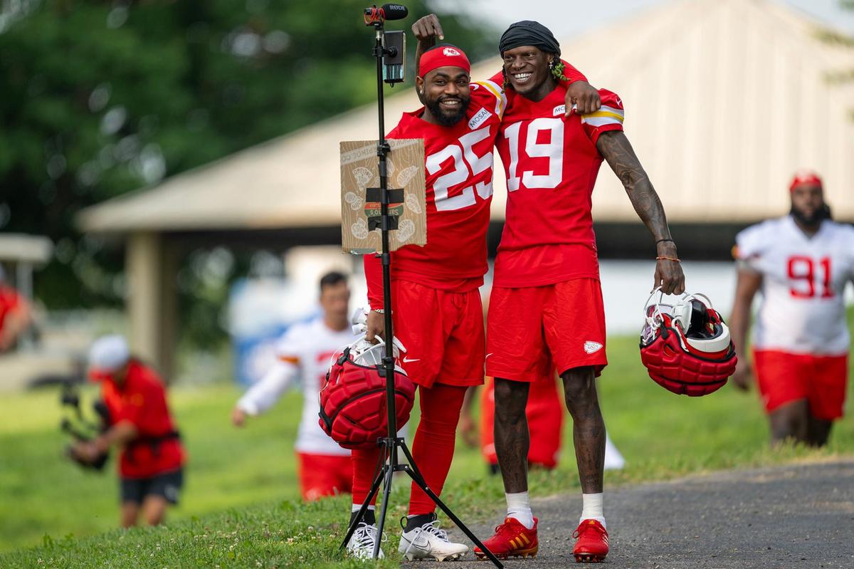 Chiefs running back Clyde Edwards-Helaire, left, hams it up with wide receiver Kadarius Toney before training camp practice at Missouri Western State University on Tuesday, July 23, 2024, in St. Joseph.
