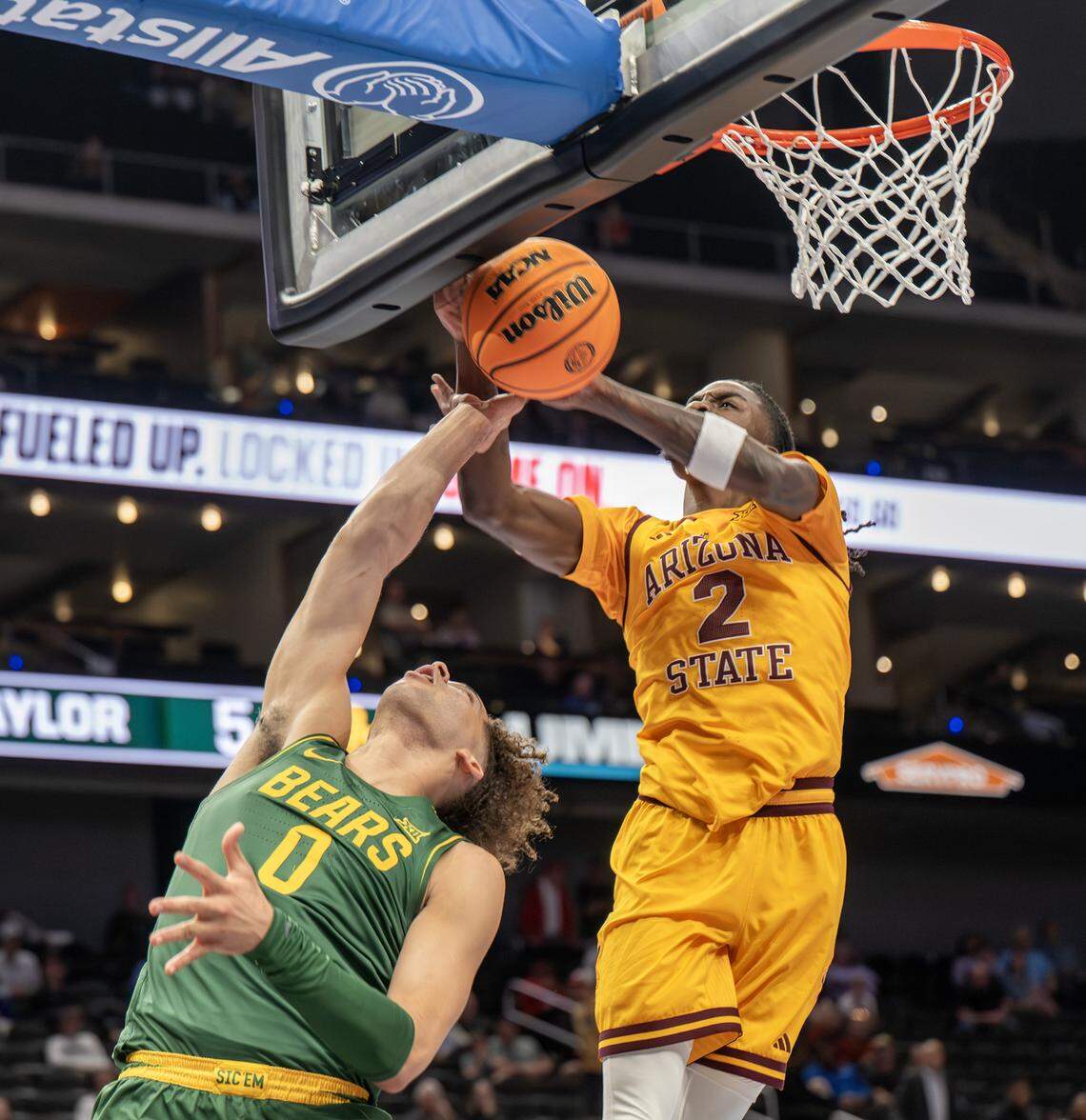Arizona State Sun Devils guard Anthony Johnson (2) blocks a shot by Baylor Bears guard Dan Skillings Jr. (0) during the first half of the Big 12 Men's Basketball Tournament at T-Mobile Center on Tuesday, March 10, 2026, in Kansas City.