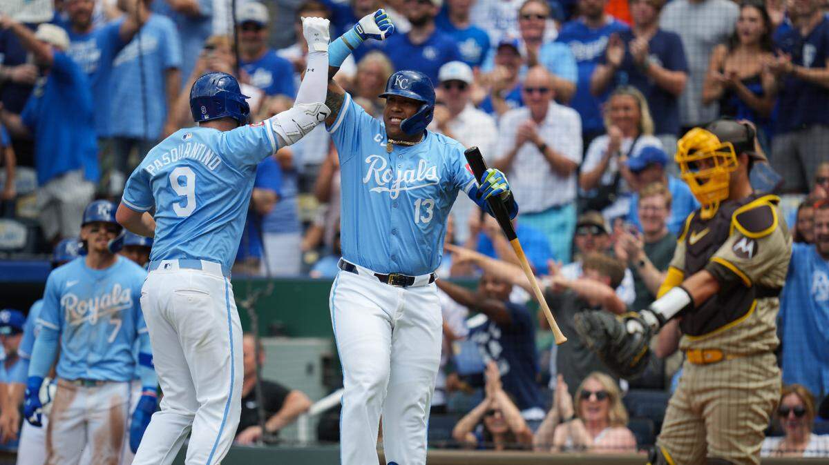 Kansas City Royals first baseman Vinnie Pasquantino (9) celebrates with captain Salvador Perez (13) after hitting a home run against the San Diego Padres during the first inning at Kauffman Stadium on June 1, 2024.