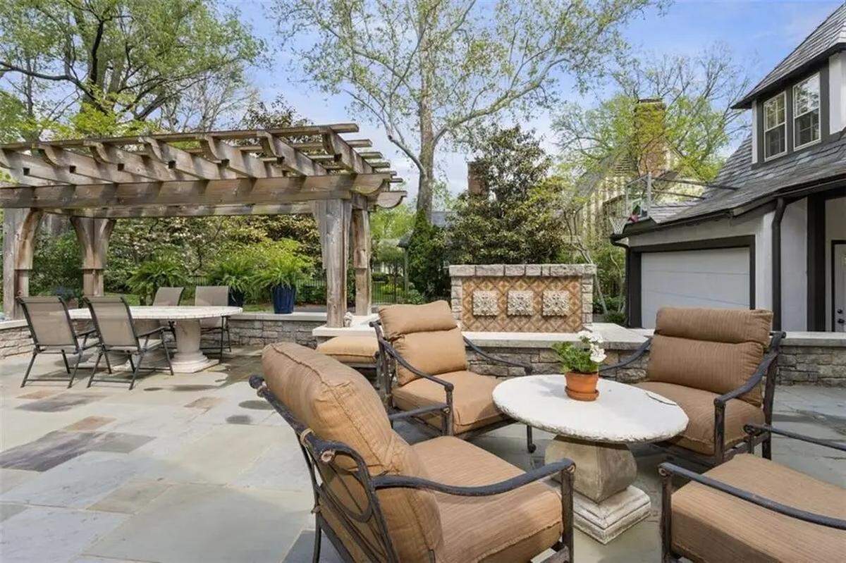 There is a fountain and two car garage in the backyard of 434 W. 56th St. Located just south of Loose Park, this Tudor-style home is listed for $1.9 million.