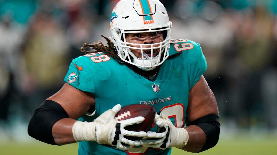 Miami Dolphins guard Robert Hunt (68) carries the ball during the second half of an NFL football game against the Baltimore Ravens, Thursday, Nov. 11, 2021, in Miami Gardens, Fla. (AP Photo/Wilfredo Lee)