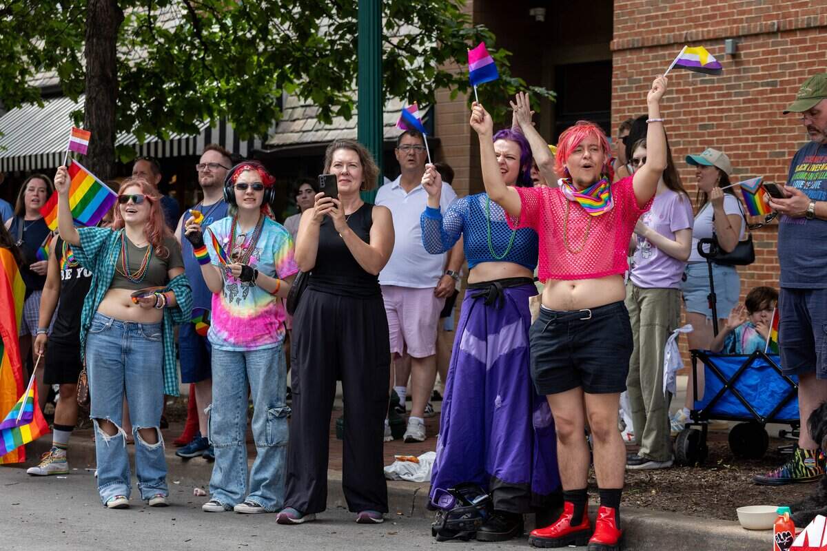 Parade goers watch the annual Kansas City Pride Parade from the side of the street at Westport Rd on Saturday, June 6, 2026.