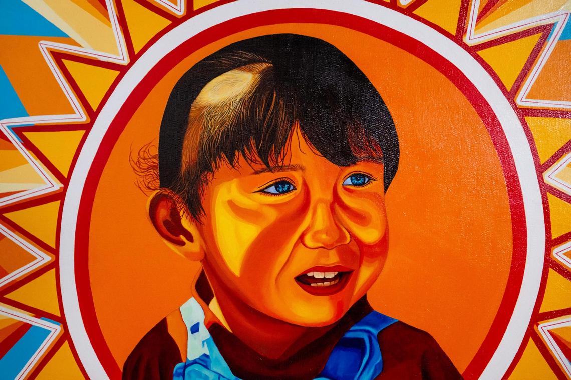 Cesar Velez’s work “Libre” was painted from a boyhood photo of the artist. Velez says the image shows him stepping out of the shadows into the light, which he equates to coming out about his undocumented immigration status.