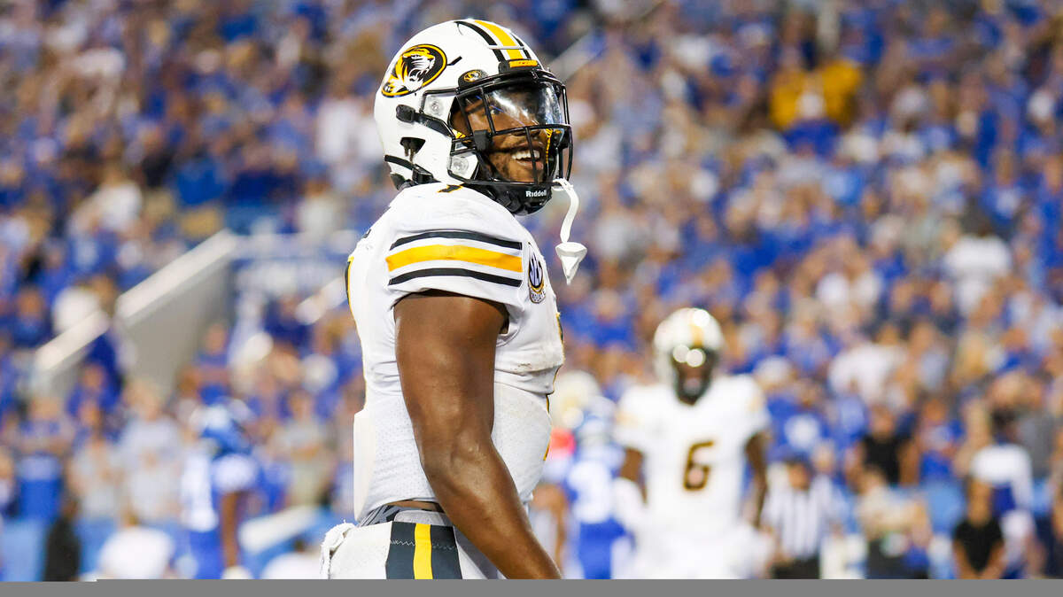 Missouri running back Tyler Badie (1) celebrates scoring a touchdown during a NCAA college football game against Kentucky in Lexington, Ky., Saturday, Sept. 11, 2021. (AP Photo/Michael Clubb)