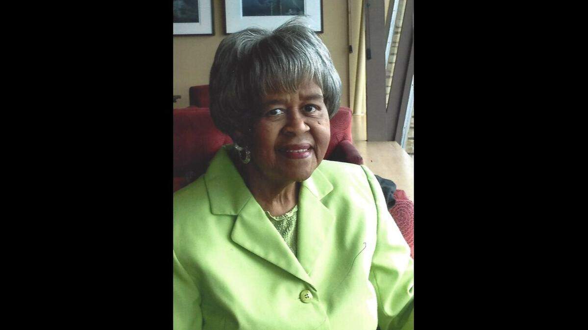 Ella Rowan smiles for a photo. Rowan, who died on Jan. 11 at the age of 89, was the coordinator of the Kansas City, Missouri school district library system, deciding the book catalogue and lessons for kids of all ages.