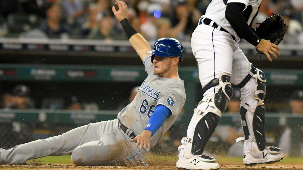 Kansas City Royals’ Ryan O’Hearn slides safely home on a sacrifice fly from Whit Merrifield in the third inning of a baseball game against the Detroit Tigers, Friday, Sept. 24, 2021, in Detroit. (AP Photo/Jose Juarez)