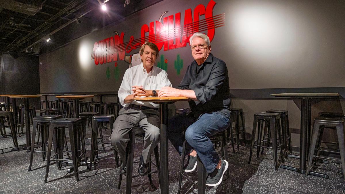 Mitch Kerns and Jack Hanrahan, founders of Guitars and Cadillacs, are resurrecting the once-popular music venue for a new location in Rosana Square in Overland Park.