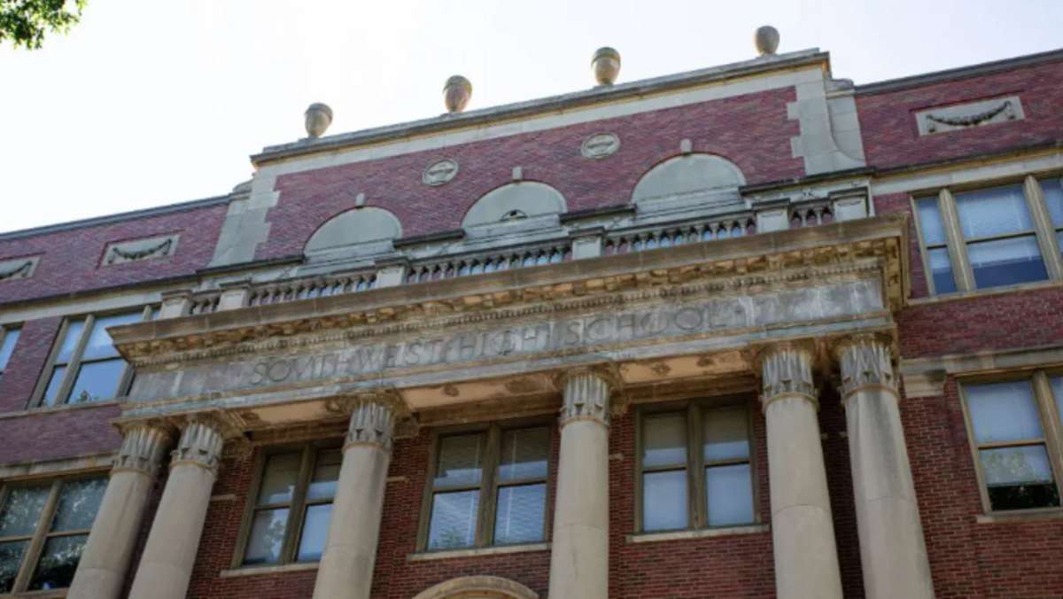 The front of Southwest High School. Alumni say a lightning strike damaged one of the decorative urns that top the building.
