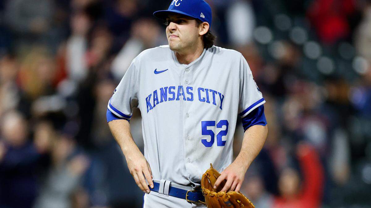 Kansas City Royals starting pitcher Daniel Lynch reacts after giving up a two-run home run to Cleveland Guardians’ Owen Miller during the fifth inning of a baseball game, Tuesday, Oct. 4, 2022, in Cleveland. (AP Photo/Ron Schwane)