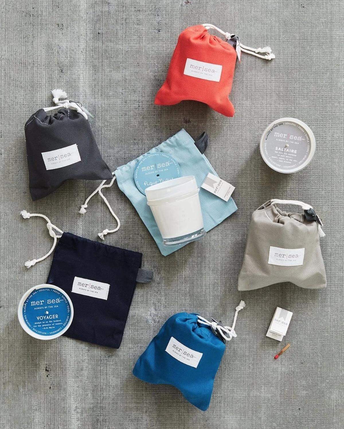 Mer-Sea & Co. candles come in tactile canvas bags and scents that evoke the ocean.