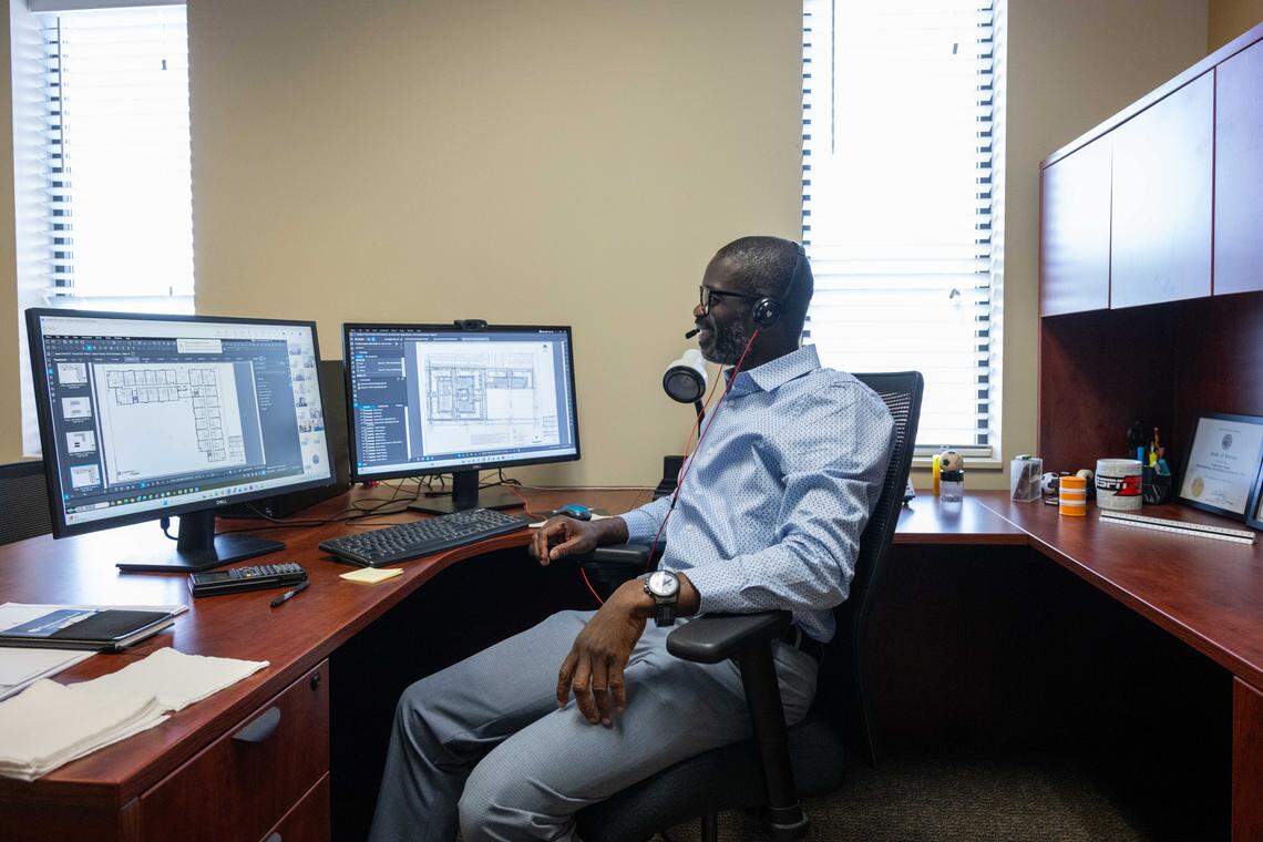 Senior Project Manager Lamin Nyang sits in a conference call at the offices of Taliaferro & Browne, Inc, on Wednesday, February 11, 2026. Nyang has been with the firm for over a decade.