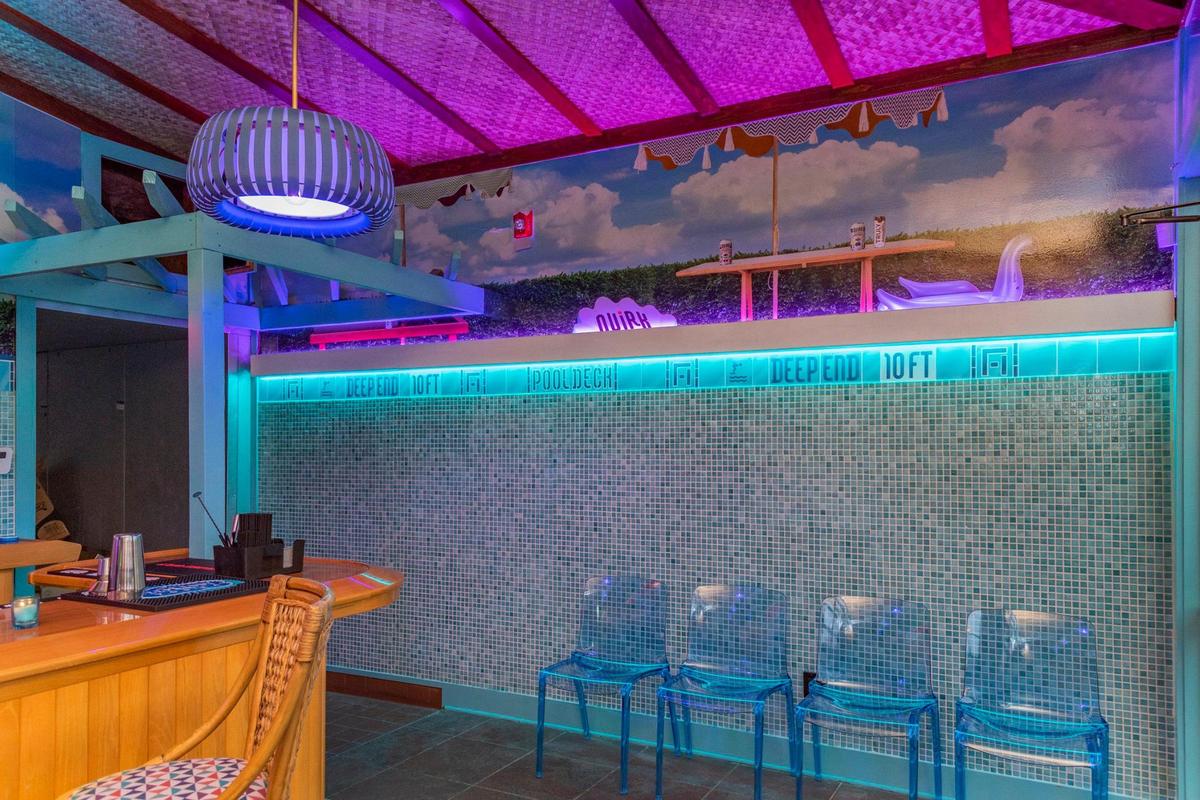 Fountain Haus’ rooftop pool deck was renovated to resemble the inside of an empty swimming pool, complete with shiny ceramic tile.