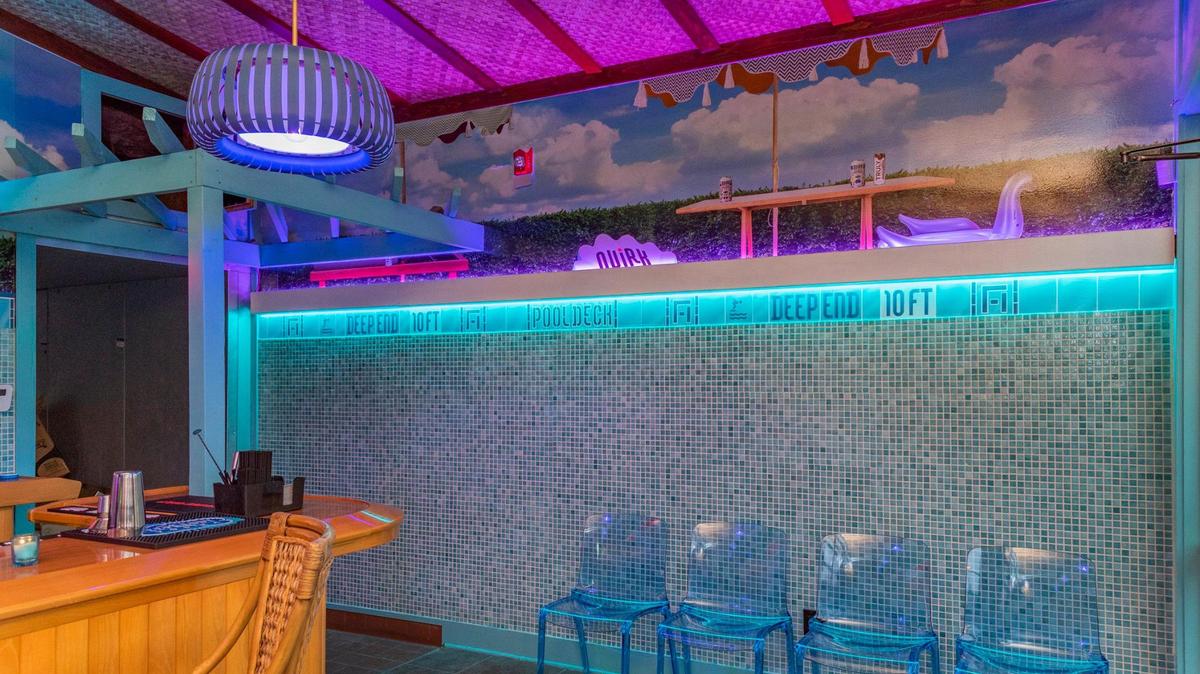 Fountain Haus’ rooftop Pool Deck was renovated to resemble the inside of an empty swimming pool, complete with shiny ceramic tile.