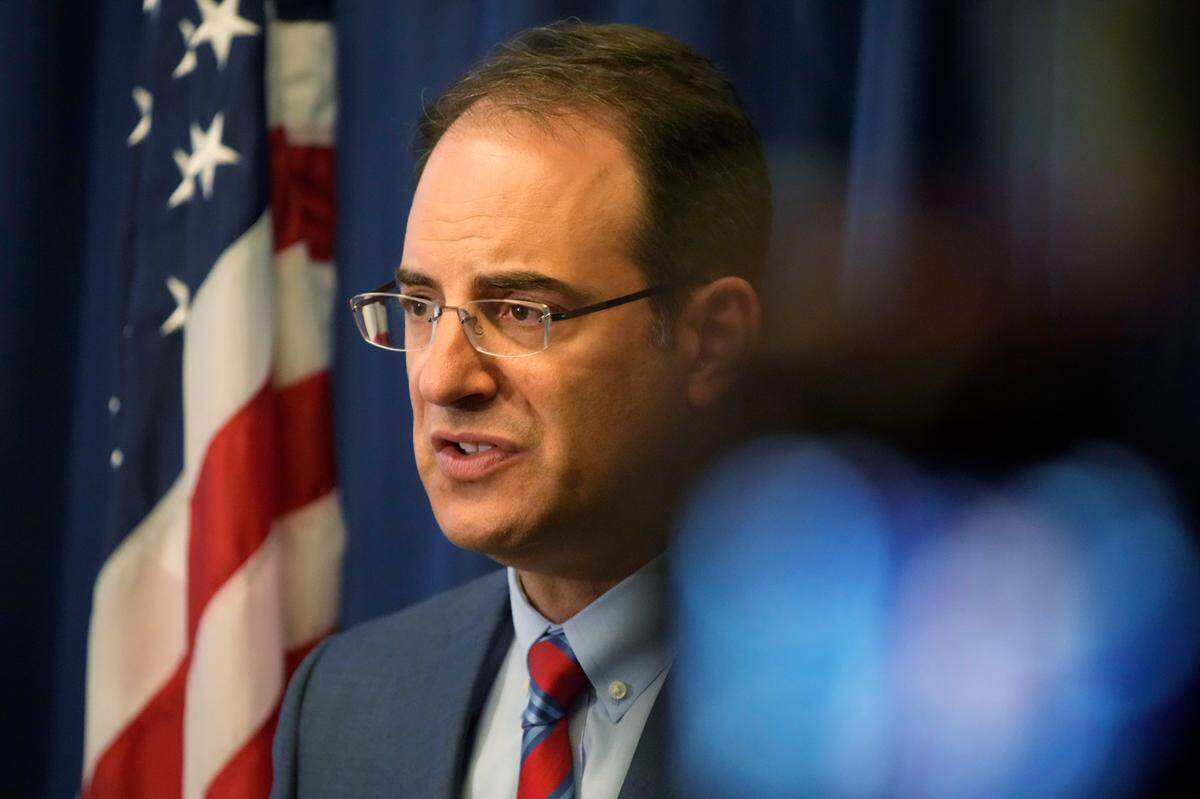 Colorado Attorney General Phil Weiser makes a point at a news conference in Denver, Wednesday, Sept. 15, 2021. Weiser says a civil rights investigation begun amid outrage over the death of Elijah McClain has determined that the Aurora, Colo., Police Department has a pattern of racially-biased policing. (AP Photo/David Zalubowski)