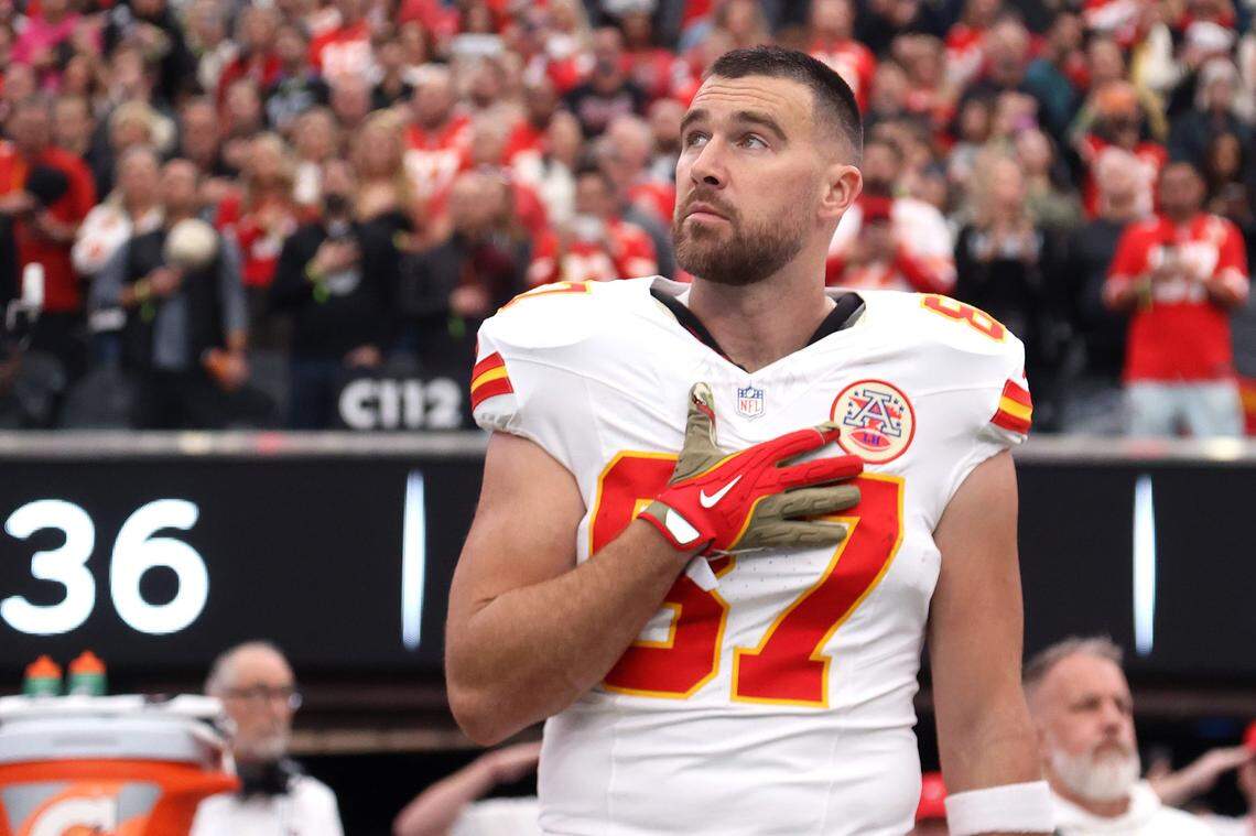 Kansas City Chiefs tight end Travis Kelce stands with hand on heart before an NFL Week 18 game against the Raiders at Allegiant Stadum in Las Vegas on Sunday, Jan. 4, 2026.