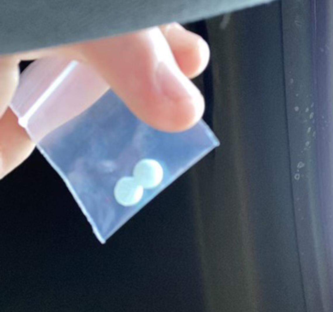 Before he died last summer, 16-year-old Cooper Davis of Shawnee posed with two blue pills he thought were Percocet. He took half of one pill that was laced with fentanyl and died.