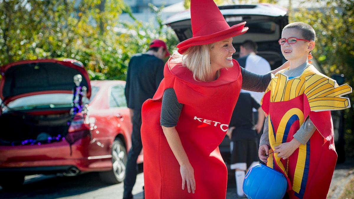 An Overland Park mom attends a trunk or treat event with her son in 2019.
