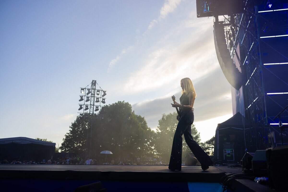 Sheryl Crow walks across the stage during their FIFA Fan Fest concert at Fan Fest on Friday, July 10, 2026.