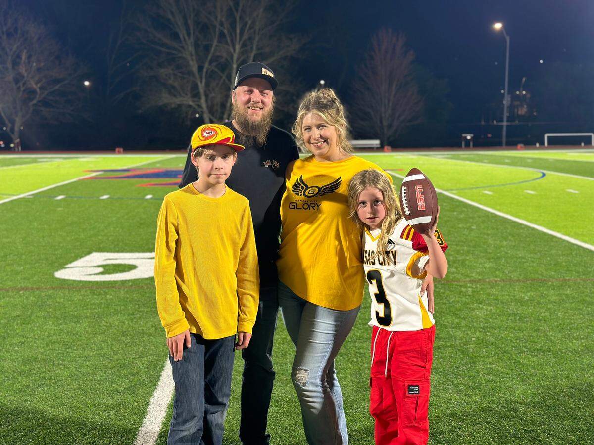 From left to right, Elena’s older brother Thomas, her father Nick, her mother Stephanie, and Elena don Chiefs and Glory gear after a Saturday tailor-made to show Elena women play football too. A TikTok video of Elena went viral after a boy at her school told her girls don’t play football. The Glory invited her to watch their first game of the season that they won 20-14.