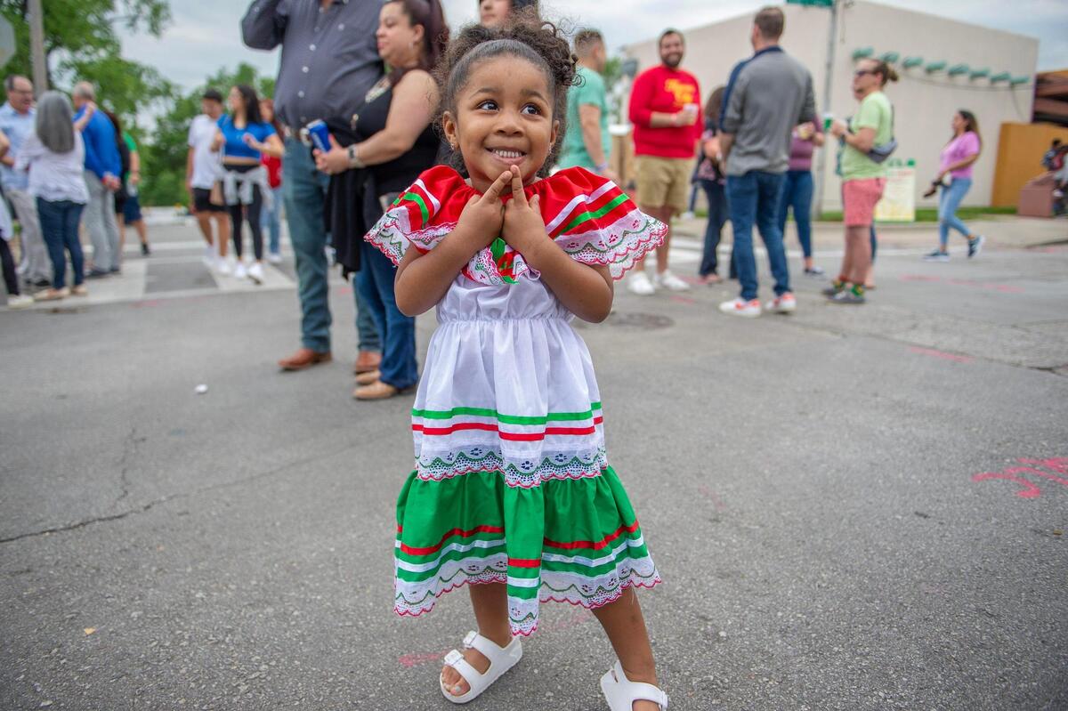 Two-year-old Chanel Washington showcases her Folklórico dress during the Cinco de Mayo celebration at Guadalupe Centers on Friday, May 5, 2023, in Kansas City.