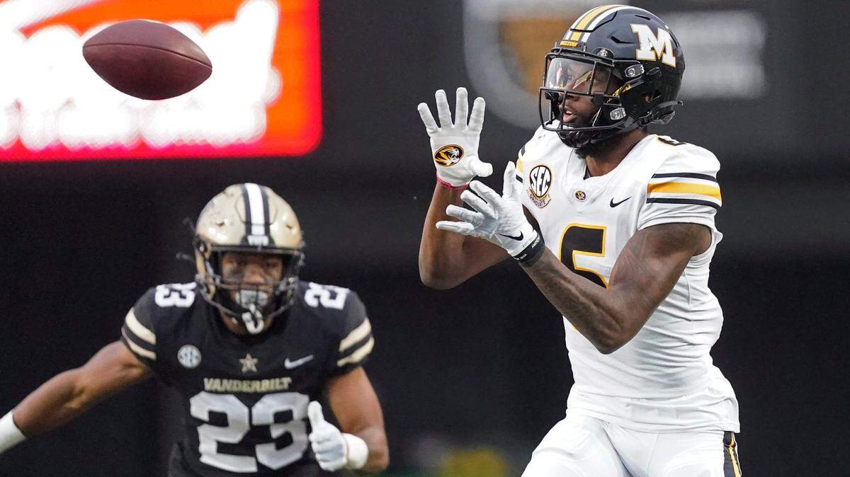 Missouri wide receiver Keke Chism (6) catches a pass in front of Vanderbilt cornerback Jaylen Mahoney (23) in the second half of an NCAA college football game Saturday, Oct. 30, 2021, in Nashville, Tenn. (AP Photo/Mark Humphrey)