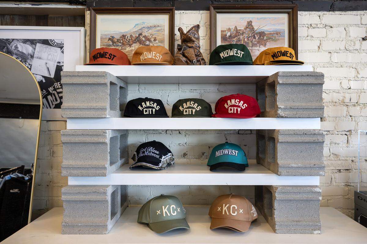 A variety of hats are displayed on shelves at Made Mobb on Wednesday, March 18, 2026, in Kansas City.