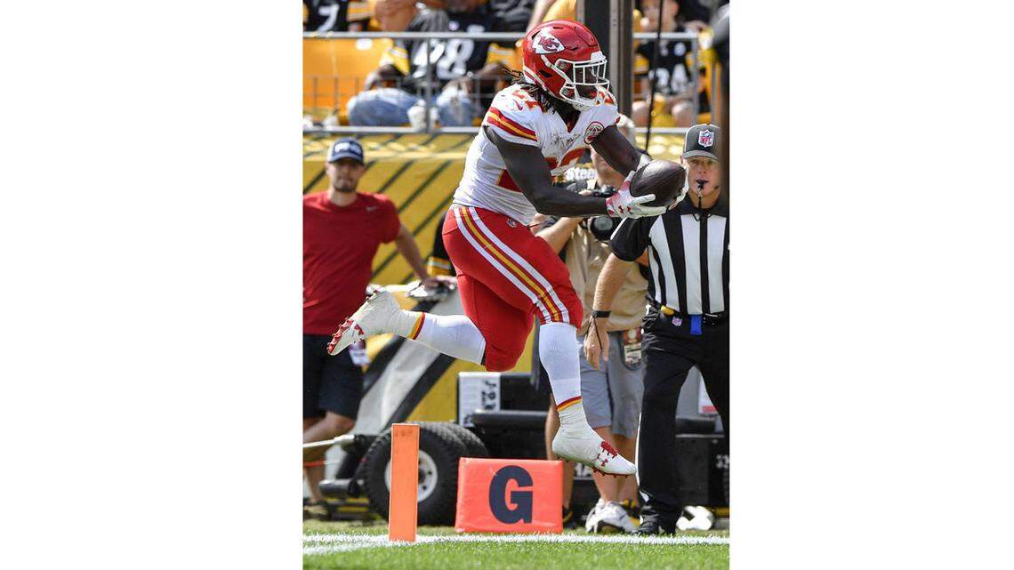 Kansas City Chiefs running back Kareem Hunt jumps into the end zone for a touchdown on a five-yard reception from Chiefs quarterback Patrick Mahomes in the first quarter against the Steelers in Pittsburgh. It was Mahomes’ seventh touchdown pass of the 2018 regular season.