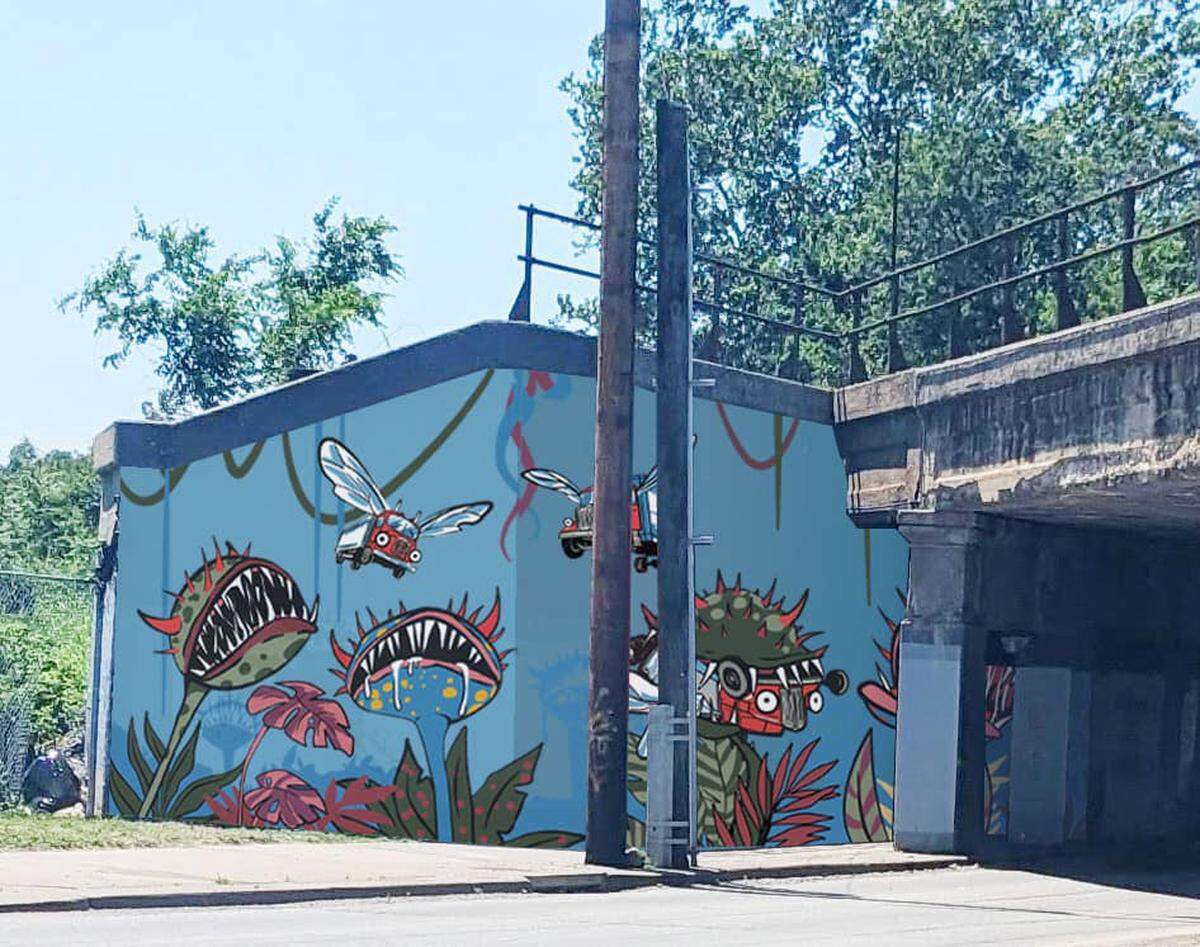Venus flytraps snap up flying trucks in concept art for a mural at the Independence Ave. truck-eating bridge in Kansas City. Michelle Renn and Merry Berleson created the design. Contributed by the Northeast Kansas City Chamber of Commerce. June 27, 2024.