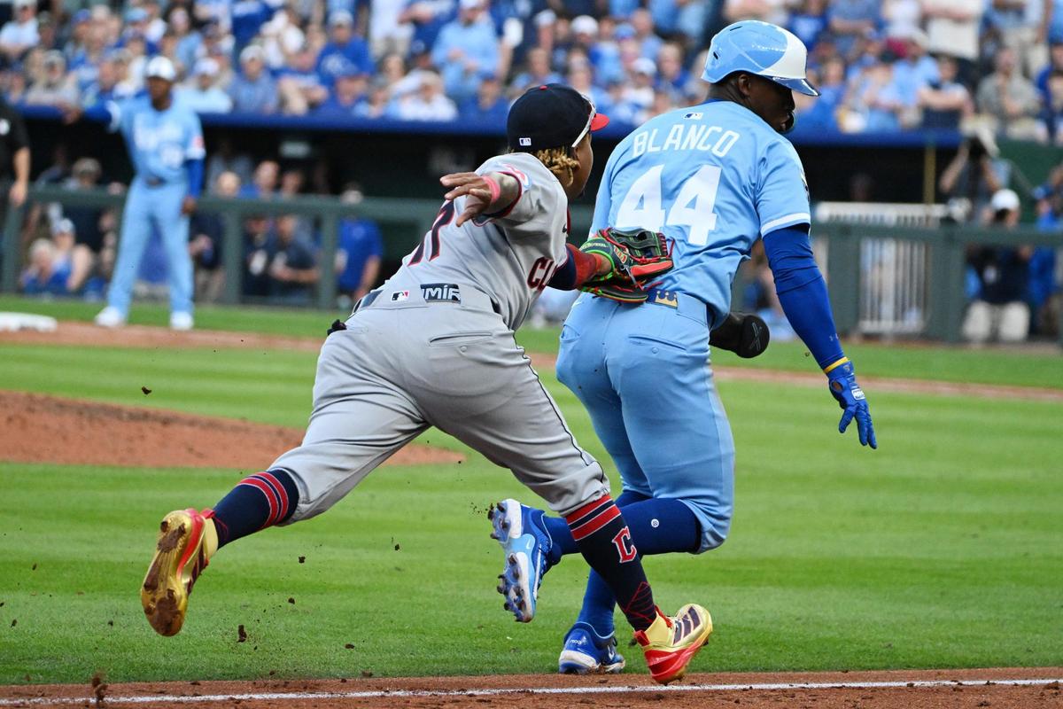 Kansas City Royals outfielder Dairon Blanco (44) gets put out on a run down between 3rd base and home plate by Cleveland Guardians third baseman José Ramírez (11) in the 8th inning during the opening day game Thursday, March 27, 2025, at Kauffman Stadium.