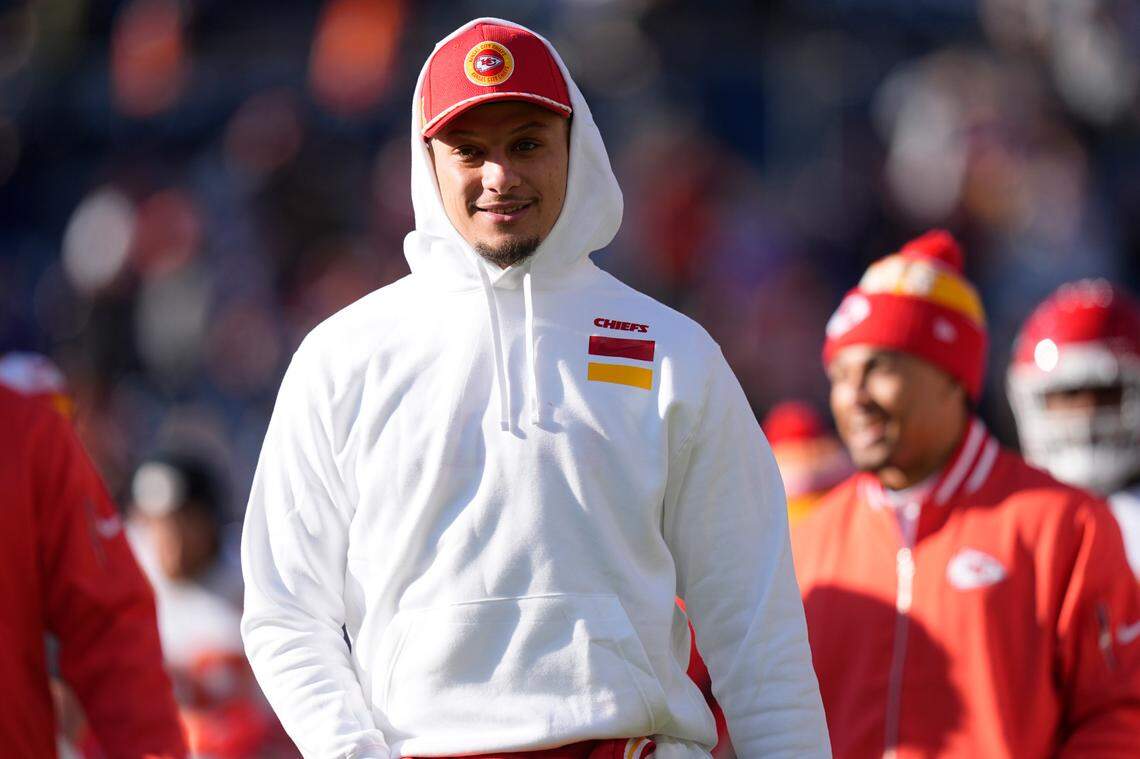 Declared inactive (as expected) for the Chiefs’ NFL Week 18 regular-season finale against the Broncos, Kansas City quarterback Patrick Mahomes walks the sideline at Empower Field at Mile High in Denver on Sunday, Jan. 5, 2025.