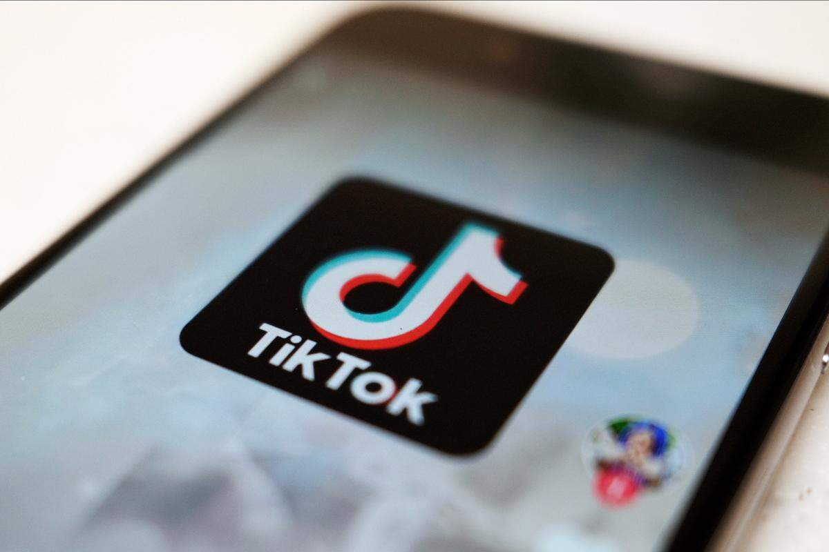 FILE - This Monday, Sept. 28, 2020, file photo, shows as logo of a smartphone app TikTok on a user post on a smartphone screen in Tokyo. Canadian e-commerce platform Shopify said Tuesday, Oct. 27, 2020, it’s made a deal with TikTok enabling merchants to create “shoppable” video ads that drive customers to online stores. (AP Photo/Kiichiro Sato, File)