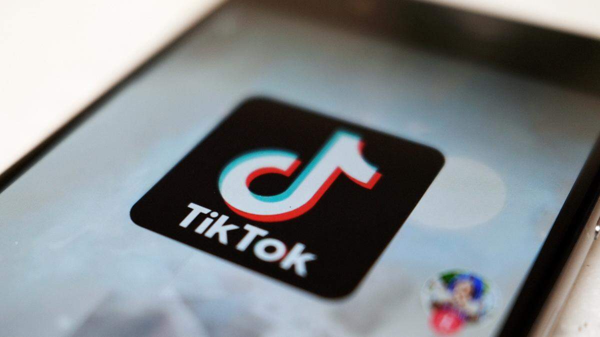 FILE - This Monday, Sept. 28, 2020, file photo, shows as logo of a smartphone app TikTok on a user post on a smartphone screen in Tokyo. Canadian e-commerce platform Shopify said Tuesday, Oct. 27, 2020, it’s made a deal with TikTok enabling merchants to create “shoppable” video ads that drive customers to online stores. (AP Photo/Kiichiro Sato, File)