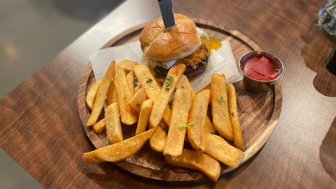 The Urban Cheddar Burger (Barham Family Farms ground chuck, cheddar, burger sauce, pickle, brioche) with an egg added.