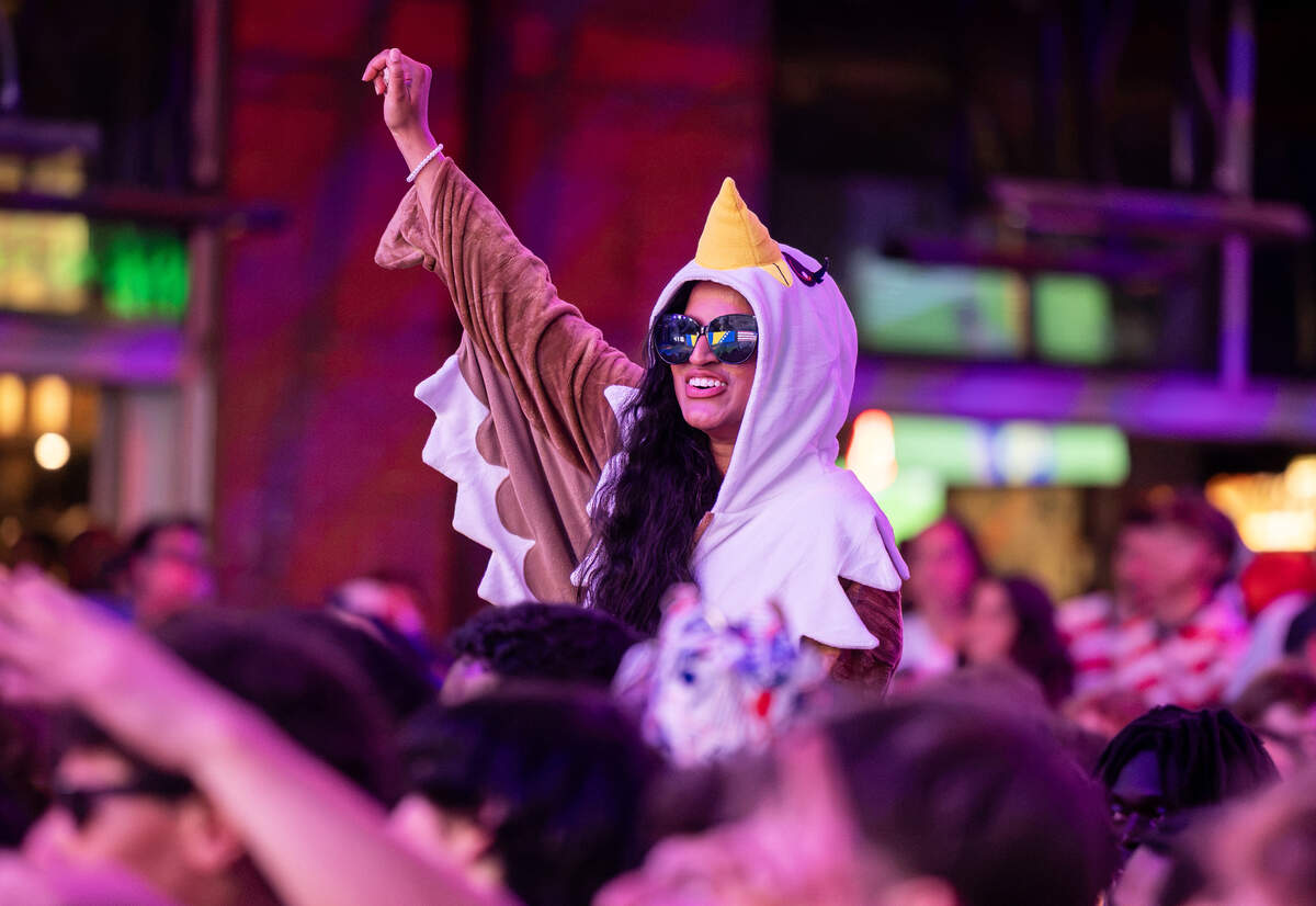 A fan dressed up as a bald eagle looks on during a World Cup watch party at KC Live! as the United States won 2-0 over Bosnia and Herzegovina on Wednesday, July 1.