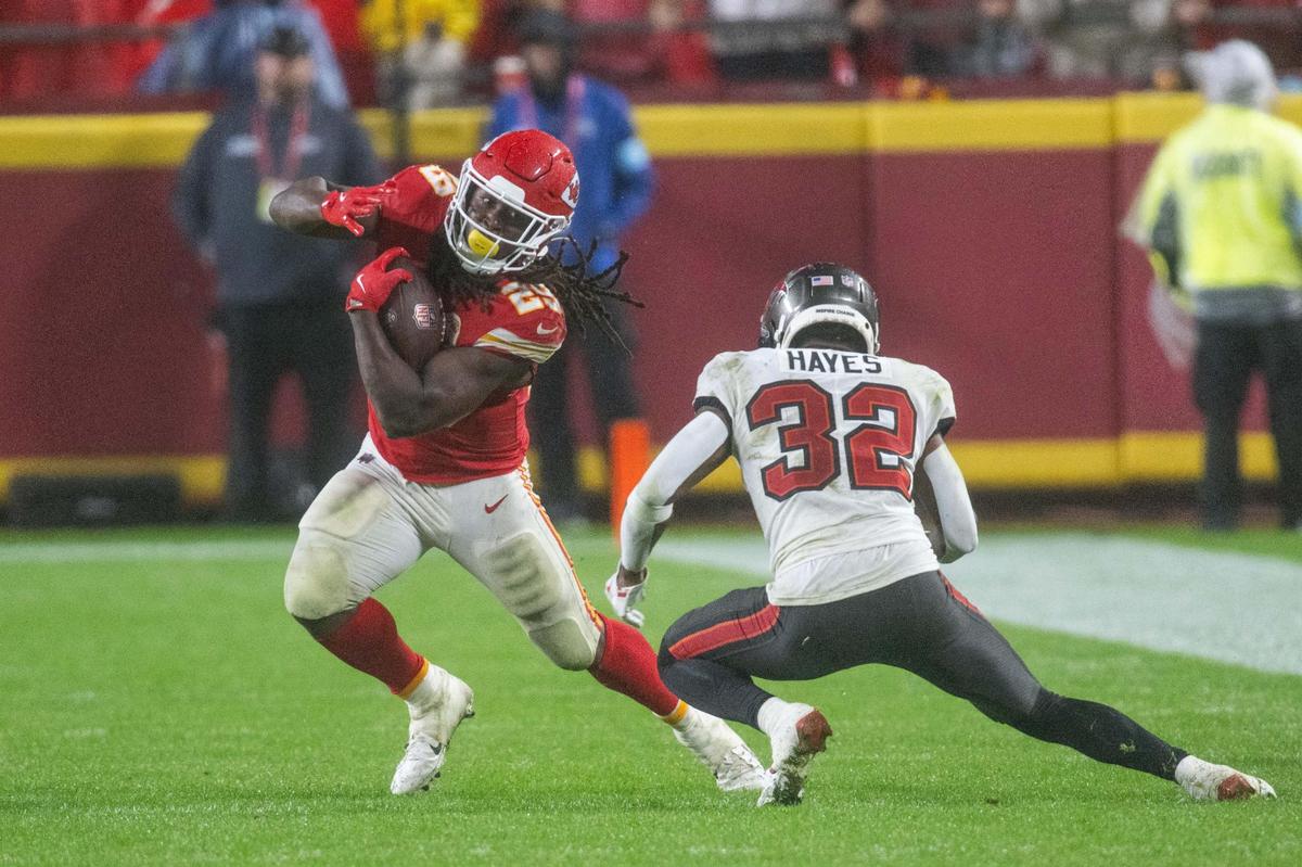 Kansas City Chiefs running back Kareem Hunt jukes Tampa Bay Buccaneers safety Josh Hayes late in the Chiefs game vs. the Tampa Bay Buccaneers on Monday, Nov. 4, 2024, at GEHA Field at Arrowhead Stadium.