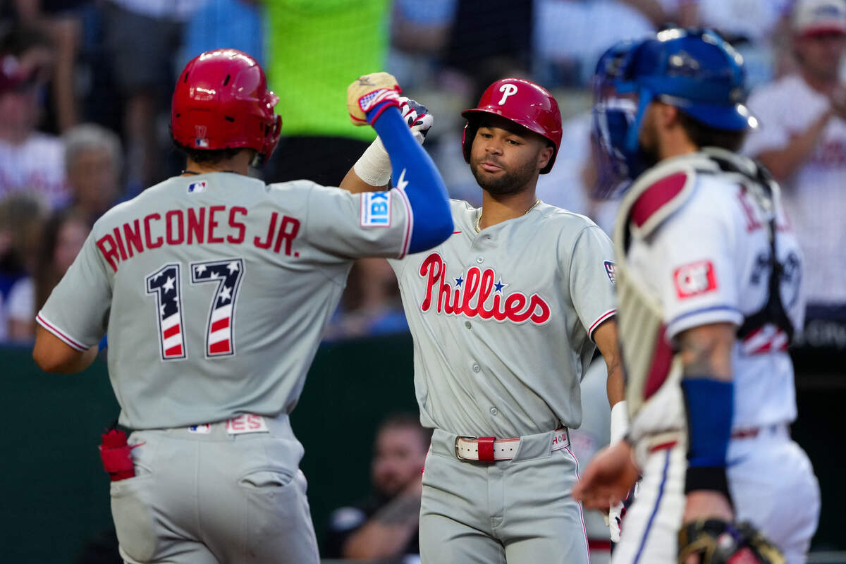 Philadelphia Phillies outfielder Gabriel Rincones Jr. celebrates a home run with teammate Justin Crawford in the fourth inning of a Saturday, July 4, 2026 MLB game against the Royals at Kauffman Stadium in Kansas City. The Phillies won 6-1.