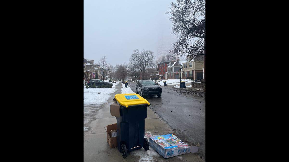 Trash and recycling was left out for collection in Union Hill Tuesday. City officials said garbage had not been collected in some neighborhoods as crews tried to catch up after winter weather delays.