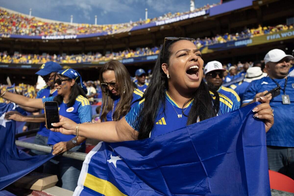 Curaçao fans cheer on their team before a FIFA World Cup group-stage soccer match against Ecuador at Kansas City (Arrowhead) Stadium in Kansas City on Saturday, June 20, 2026.