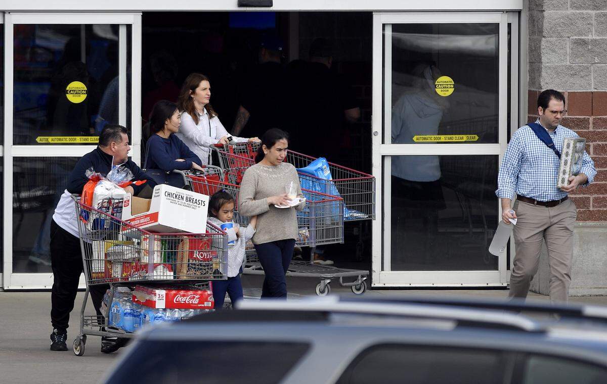 While restaurants are banned from dine-in service, grocery stores, like this one in Midtown Kansas City, have been bustling as concern about the spreading coronavirus sweeps the country.