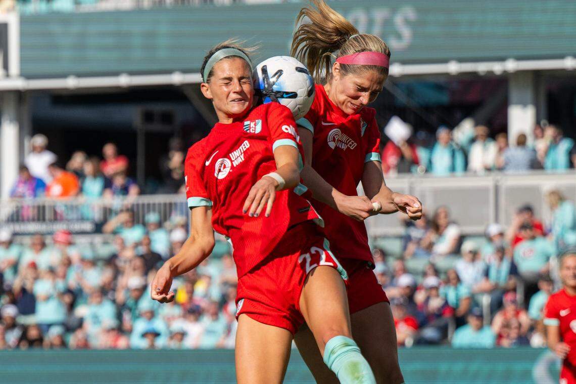 Kansas City Current midfielder Bayley Feist (22) and defender Kayla Sharples (27) go up for a header in the second half of the Current's match vs. the Utah Royals, on Saturday, March 14, 2026, at the CPKC Stadium. The Current won 2-1 against the Utah Royals.